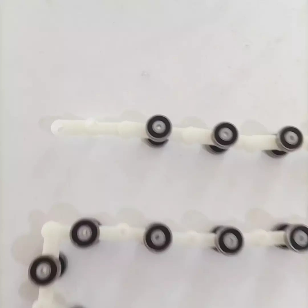 4 piezas/lote SCH409585 Cadena de pasamanos de escalera mecánica con 17 pares de rodamientos 609RS dobles